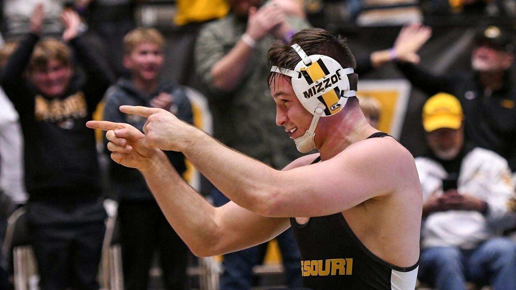 Mizzou’s Keegan O’Toole celebrates after defeating Iowa State’s Kaden Schmidt during a meet (copy) (copy)