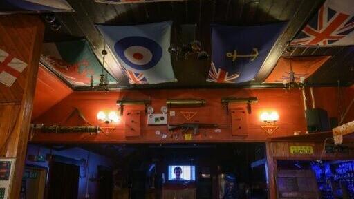 War memorabilia from the 1982 Falkland War's battle fields is displayed at The Globe Tavern pub in Stanley, Falkland Islands