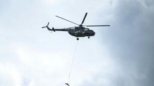 The difficult conditions in Nepal's remote settlements have forced rescuers to depend heavily on helicopters