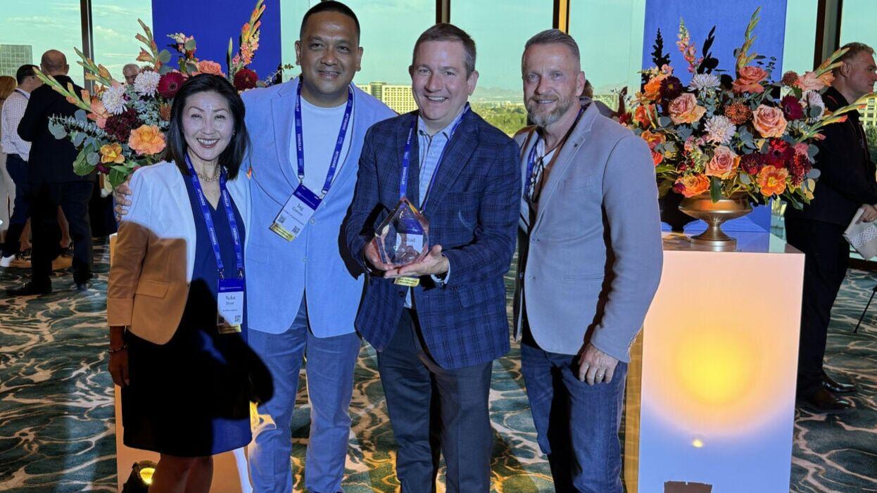 Buffalo Lodging's Team with Award