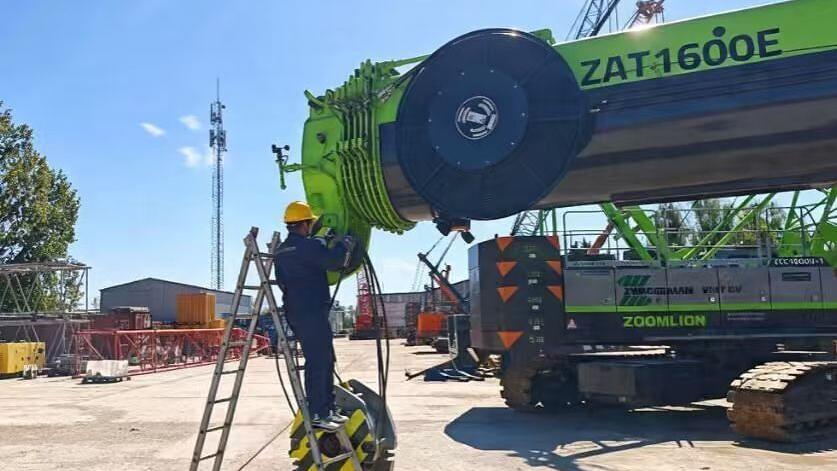 A Zoomlion service engineer performs RDW-related compliance and maintenance work on a ZAT1600E all-terrain crane in the Netherlands