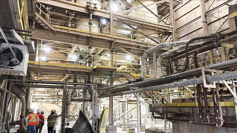 Figure 5: Installation of upgraded lighting in the autoclave area.