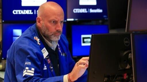 A trader works on the floor of the New York Stock Exchange (NYSE) earlier this week