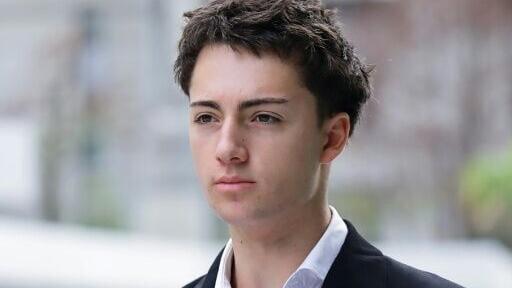 French teenager Didier Gaspard Owen Maximilien arrives at the State Courts in Singapore on July 30, 2026
