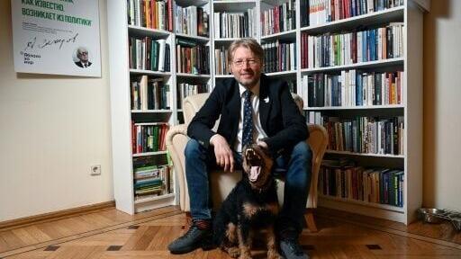 Yabloko's leader Nikolay Rybakov, seen here at the party's HQ with dog, vowed to keep on fighting
