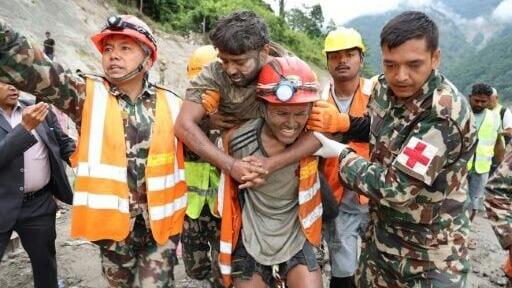 Two hydropower workers have been pulled alive from a tunnel 10 days after it was buried by debris in Nepal