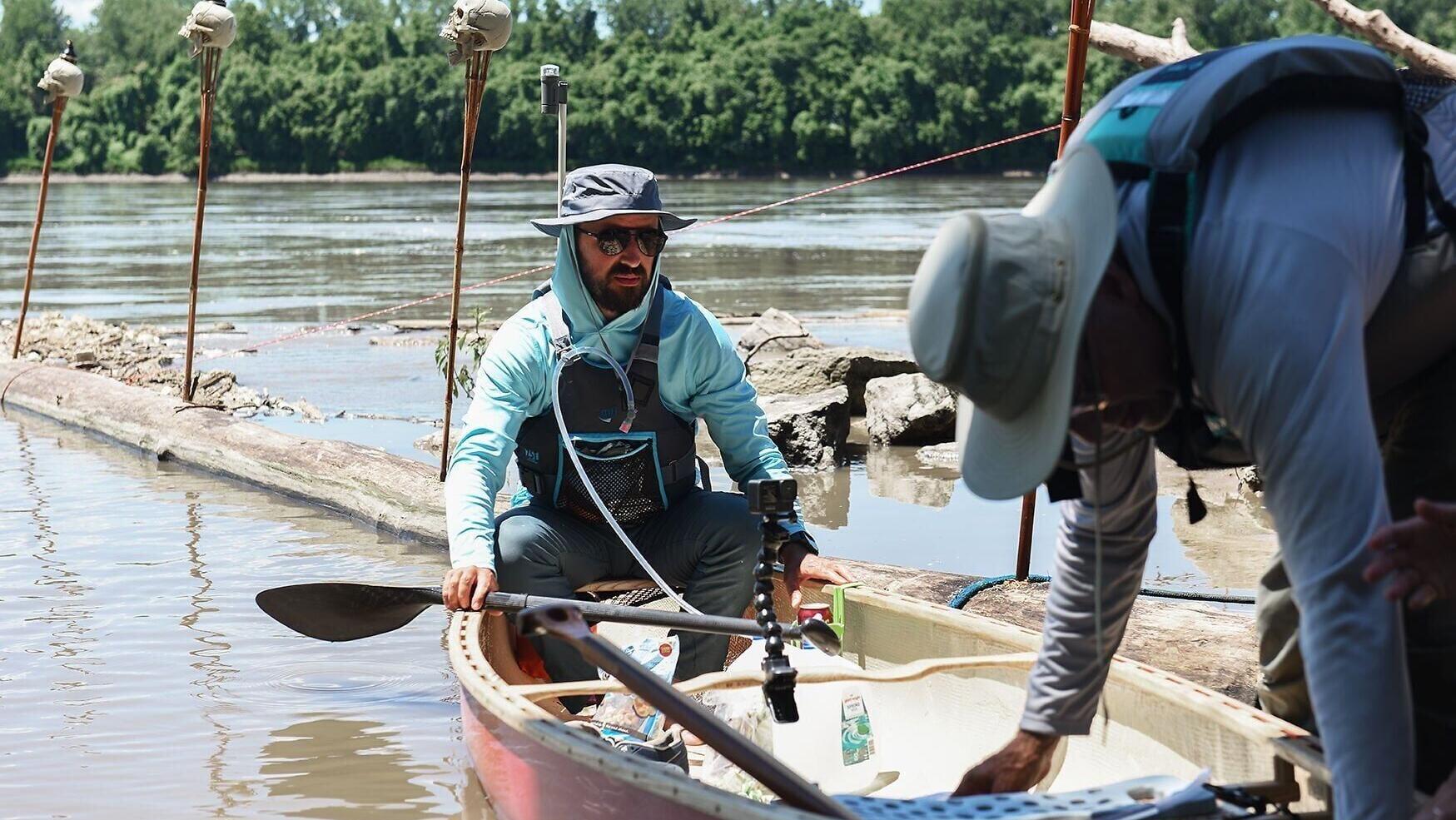 Max Wilson, left, and his father, Thomas Wilson, right, prepare to depart from Cooper's Landing (copy)