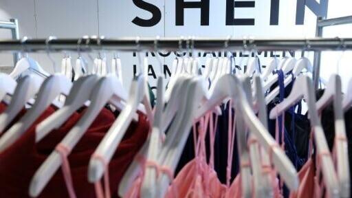 (FILES) This photograph shows the logo of the Asian e-commerce giant Shein displayed at the Bazar de l'Hotel de Ville (BHV) department store in Paris on March 19, 2026. A French appeals court on March 19, 2026 rejected the government's demand to tempora...