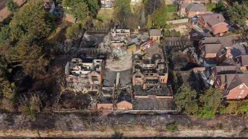 Three firefighters were hospitalised fighting that blaze southwest of Birmingham