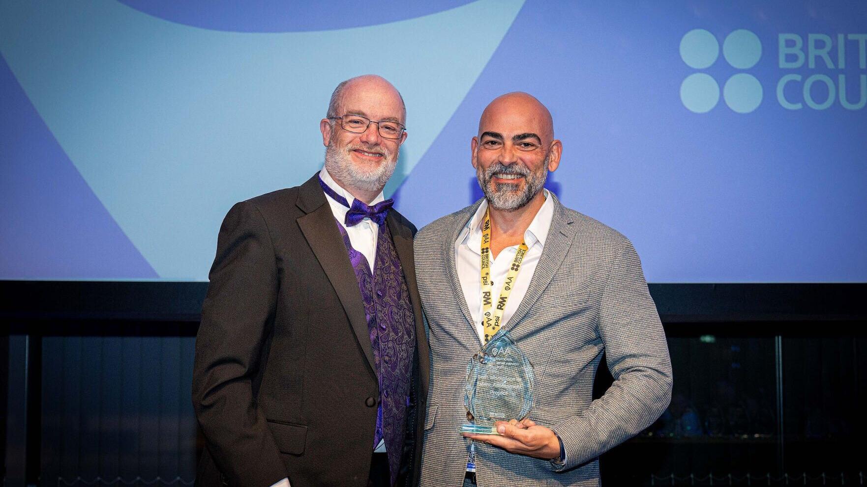Sam receiving the International e-Assessment Award for Best Talent Assessment Project.