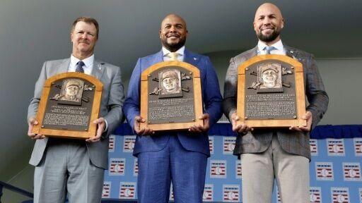 Retired Major League Baseball stars Jeff Kent, left, Carlos Beltran, center, and Andruw Jones were inducted into the Baseball Hall of Fame