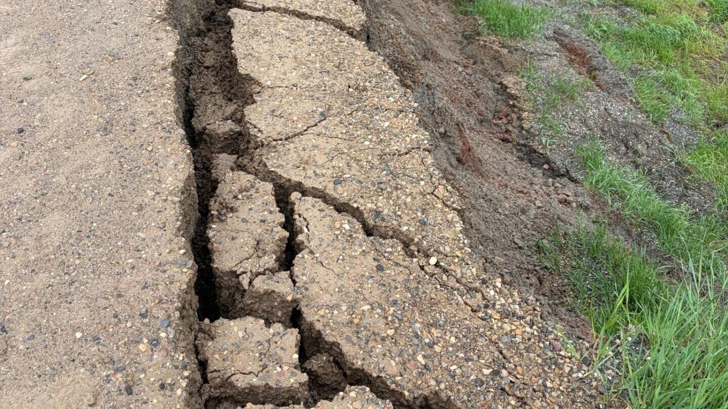 Evans Riceville Road near Belt down to one lane after slide3
