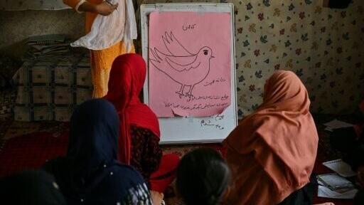 Girls studying at a secret school at an undisclosed location in Afghanistan in 2022