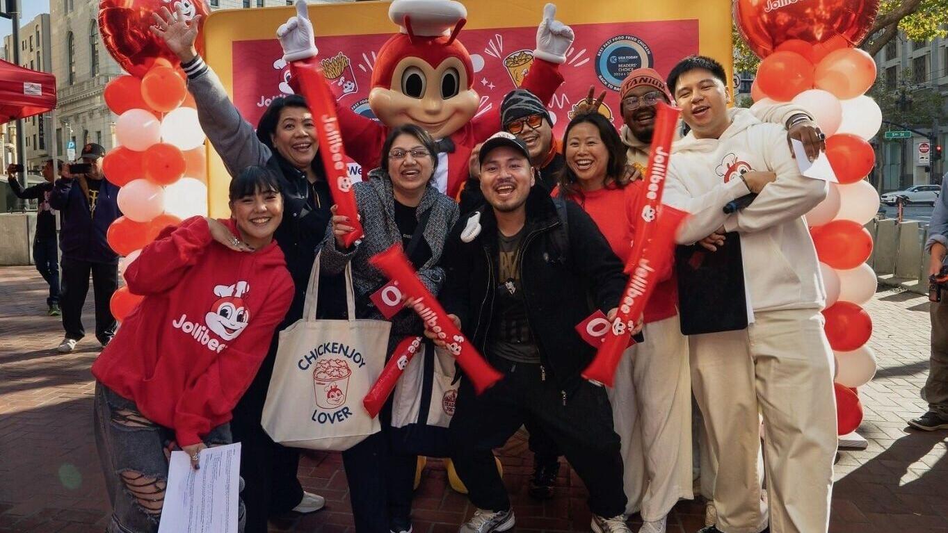 Customers celebrate at the grand opening of the new Jollibee location at 934 Market St. in downtown San Francisco on Friday, July 31, 2026. Both fans and first-time guests enjoyed lively music, free merch and photo ops with the brand's iconic Jolly Bee ...