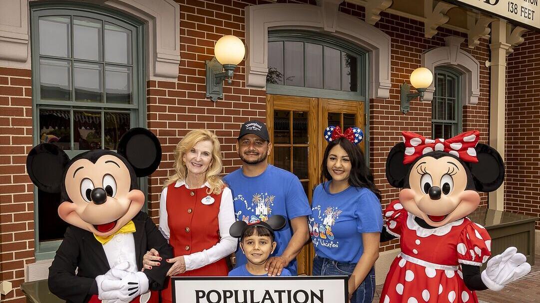 Disneyland Resort President Jill Estorino Greets Honorary One Billionth Guest:  Jill Estorino, President, Disneyland Resort, greets the honorary one billionth guest, Andres Robles, 8, and his parents at the Main Street, U.S.A., train station platform in...