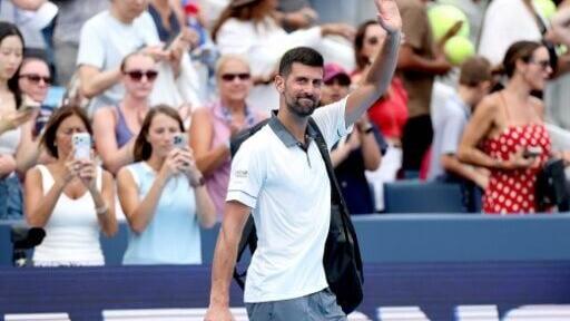 Novak Djokovic departs Stadium Court in Cincinnati after falling in his opening match to Thiago Tirante