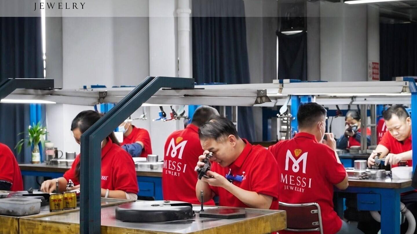 Messi Jewelry's skilled diamond cutters process lab-grown diamonds at the company's Wuzhou facility, supporting its 10,000-carat monthly processing capacity.