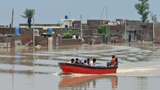 AFP journalists witnessed small motor boats chartered by volunteers ferrying residents to safety