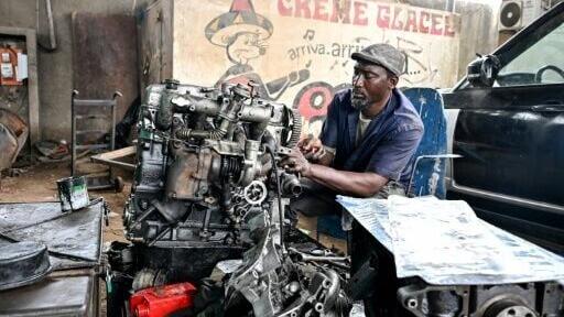 Mechanic Yacouba Sylla says he would need resources and state support to run a fully compliant workshop on which he pays taxes