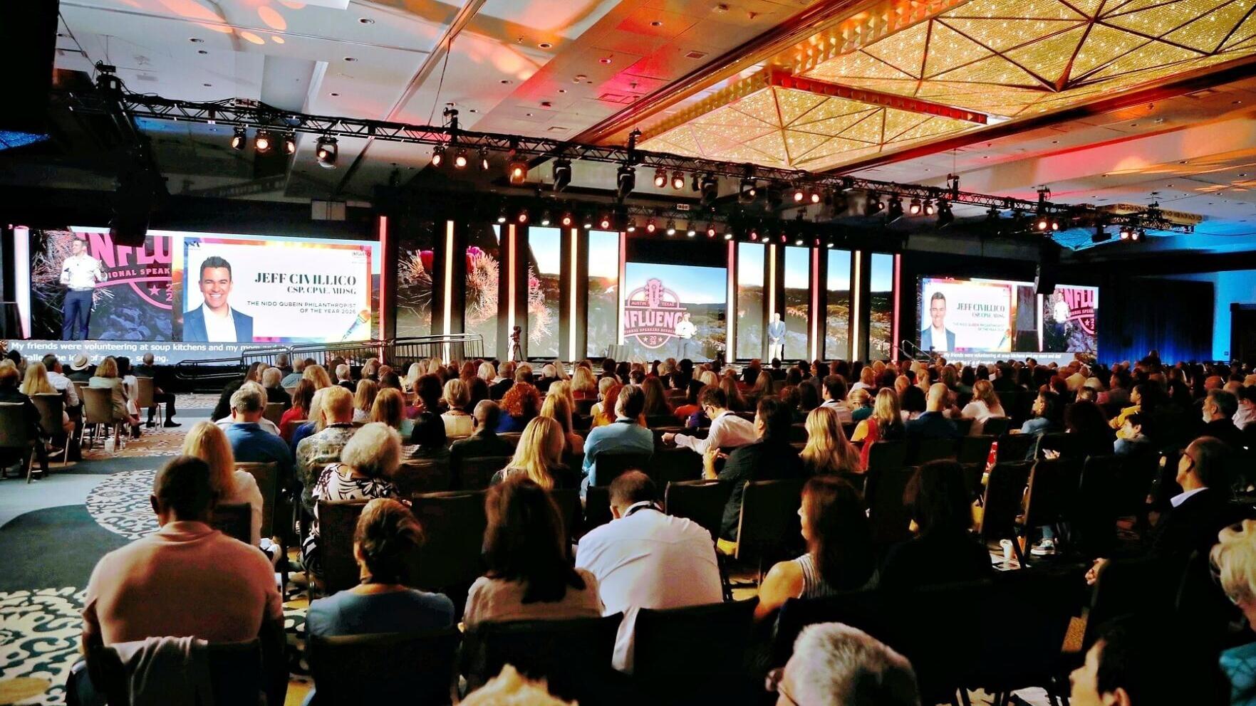 Jeff Civillico is recognized as the 2026 Nido R. Qubein Philanthropist of the Year before a full ballroom at the National Speakers Association's Influence 2026 conference in Austin, Texas. *Photo: Russell Climie / Tiberius Images