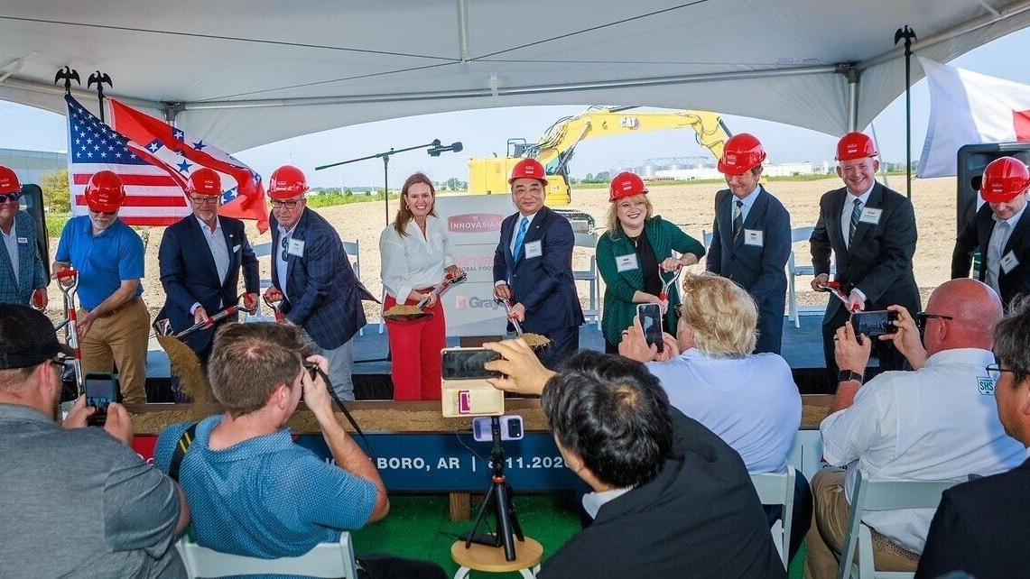 Gov. Sarah Huckabee Sanders joins the InnovAsian and Gray teams to celebrate the chicken processing facility's groundbreaking.