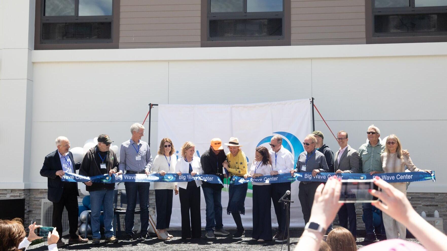 Big Wave Group's Board of Directors celebrates the opening of the Big Wave Center with California Assemblymember Marc Berman, members of the Peck and Barber families, who donated the land for the project, and one of the Center's first residents during t...