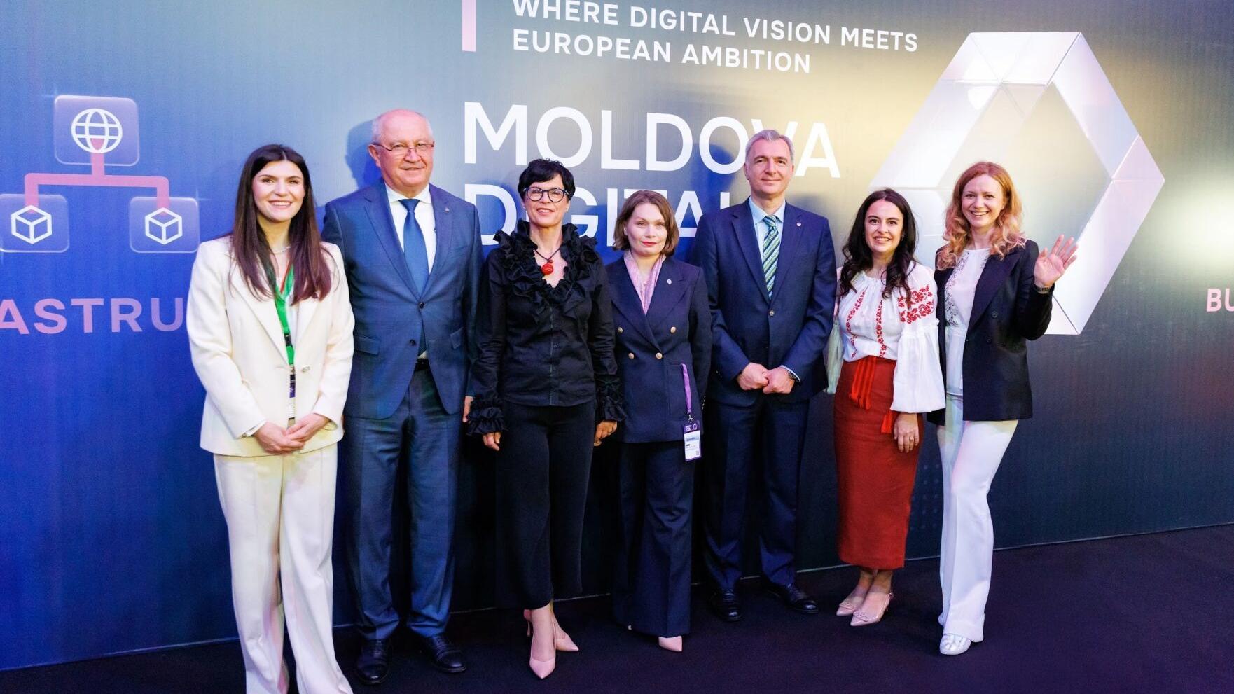 EU Commissioner for Enlargement Marta Kos, Prime Minister of the Republic of Moldova Alexandru Munteanu, and leaders  from Moldova’s government and private sector at Moldova Digital Summit 2026 in Chișinău.