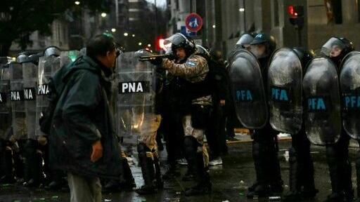 Clashes broke out between police and protesters during a demonstration against private property legislation outside the National Congress in Buenos Aires