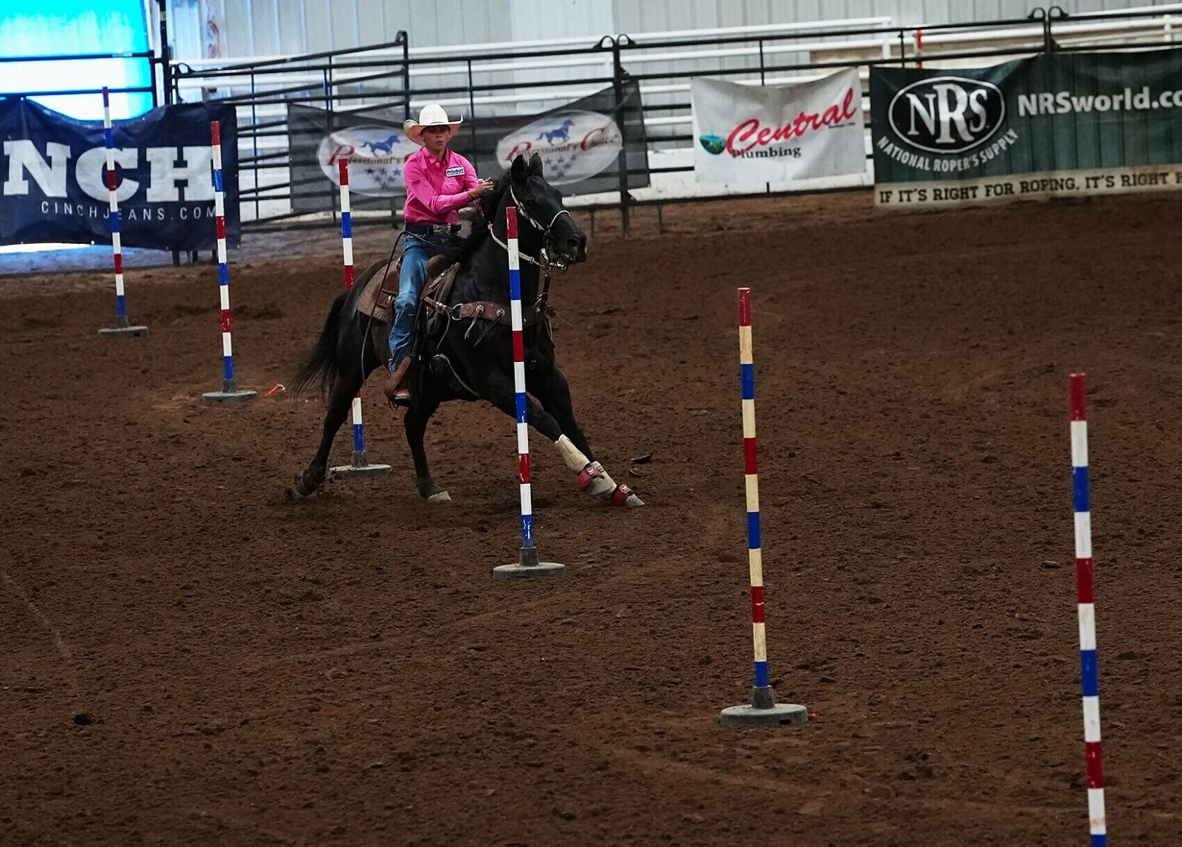Kail Wood, 15, competes in pole bending