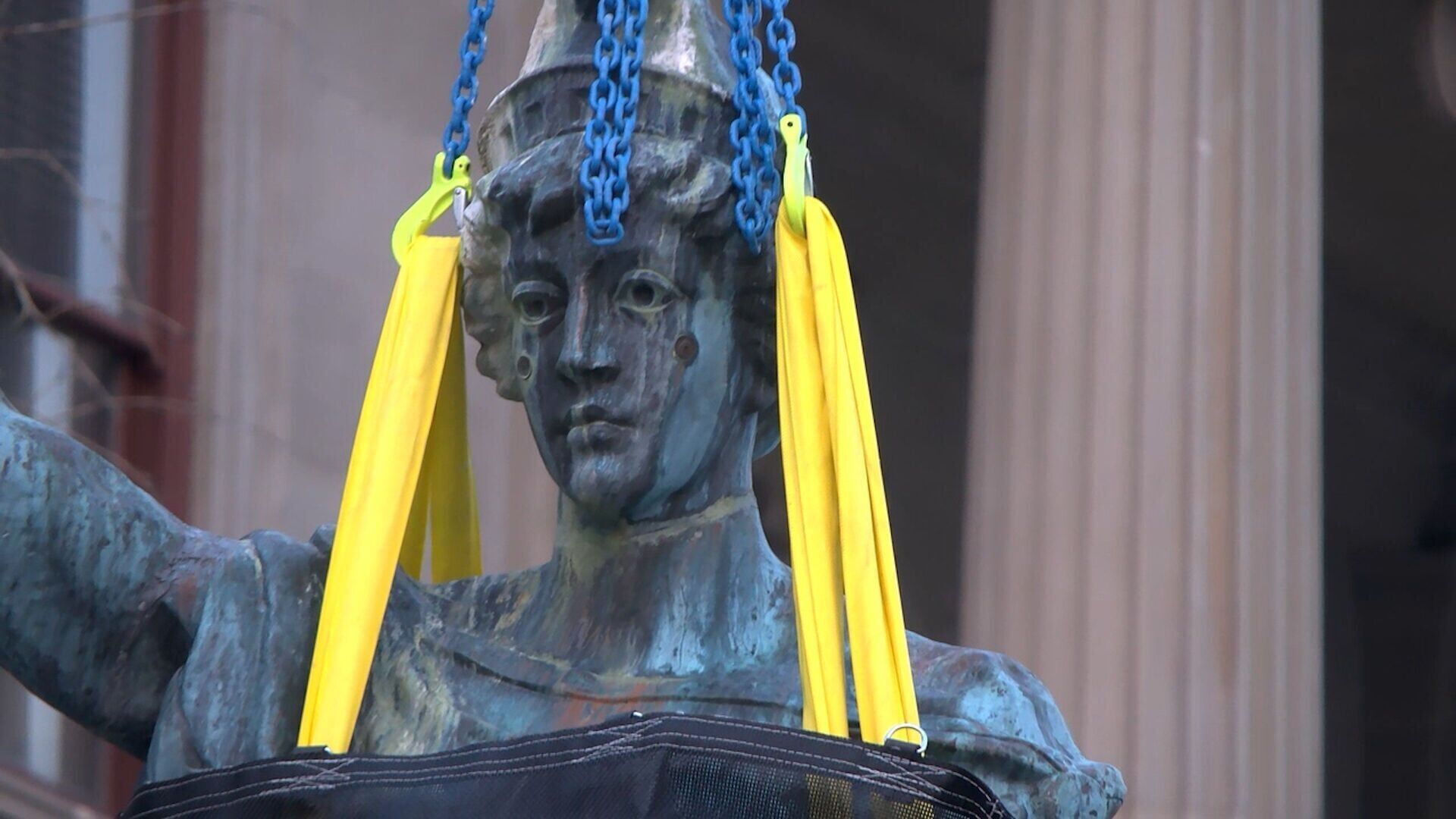 "Lady Montana" statue is removed from the top of the State Capitol building.