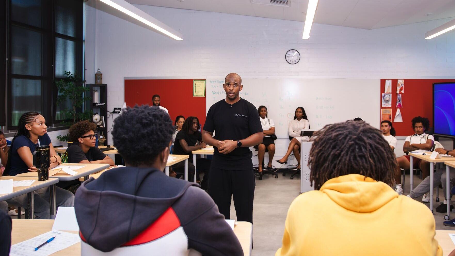 Chris Paul engages students in conversation during the kickoff of the Chris Paul Family Foundation Leadership Academy at Inglewood High School (September 10, 2026), Photo Credit: Kelby Johnson/KKO Productions