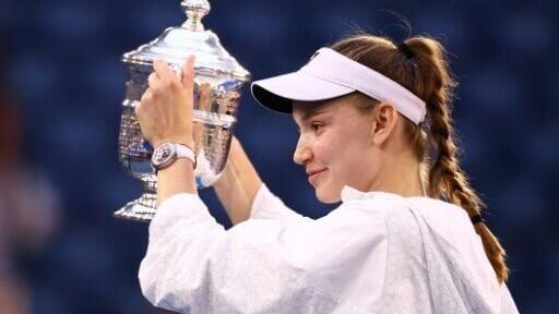 Elena Rybakina holds up the trophy after beating Aryna Sabalenka in the US Open final