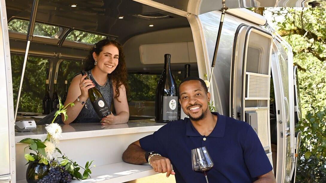 CJ and Elise McCollum with the vintage Airstream at their Carlton estate. Credit: Carolyn Wells-Kramer.