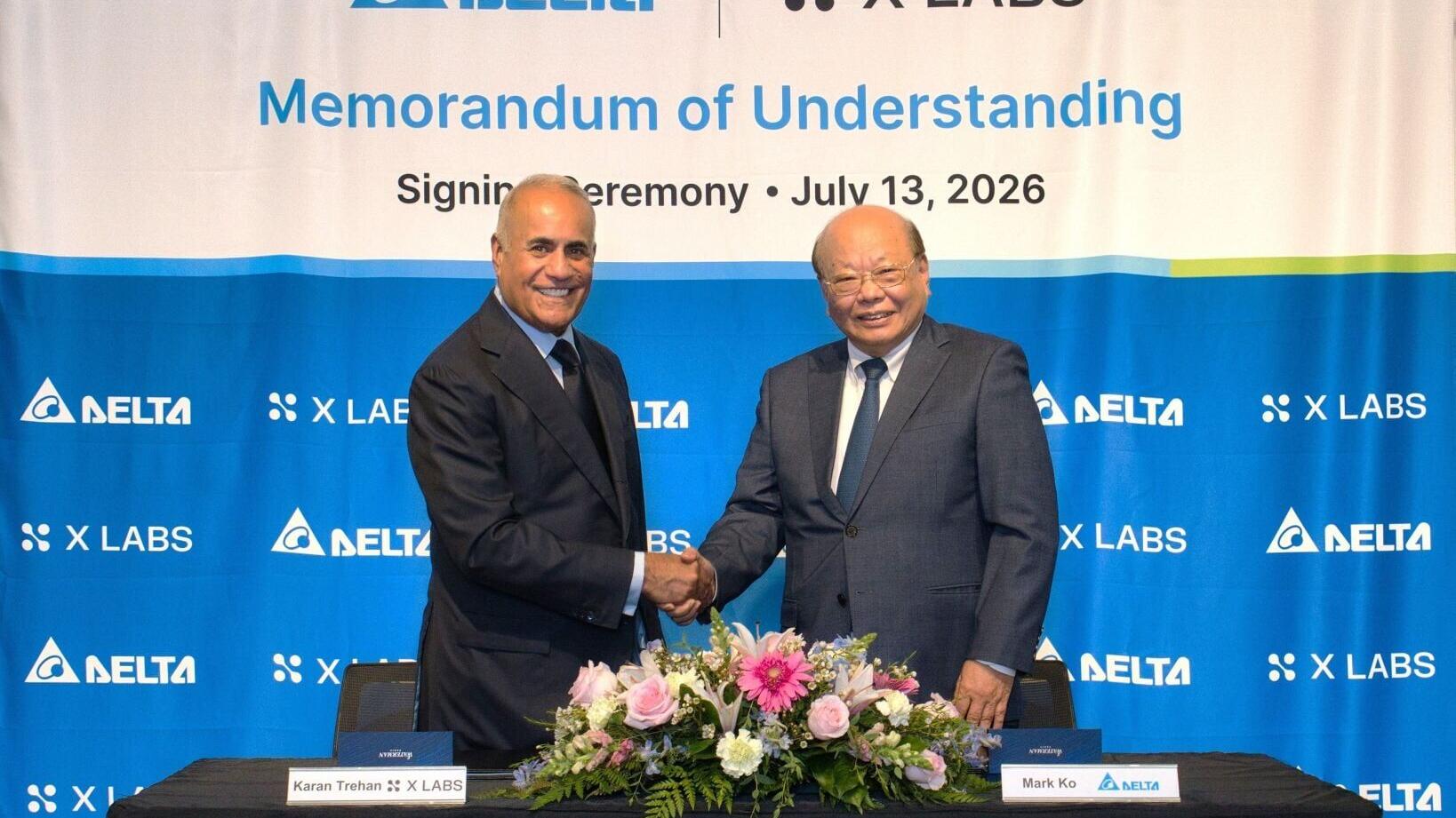 Mark Ko, Vice Chairman of Delta Electronics, Inc., and Karan Trehan, CEO and Founder of X LABS, shake hands at the MOU signing ceremony held at Delta's Fremont, California headquarters on July 13, 2026.