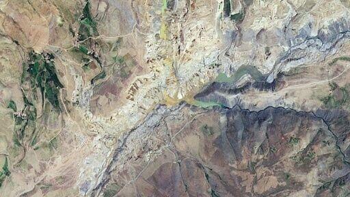 A mining site between mountains in Afghanistan's northeastern Badakhshan province