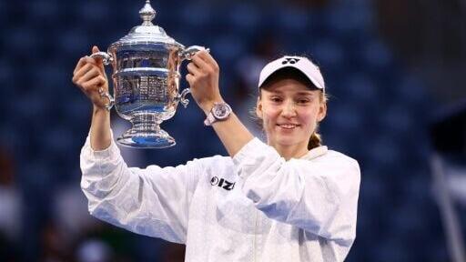 Kazakhstan's Elena Rybakina holds up the winner's trophy after defeating Aryna Sabalenka in the US Open women's final