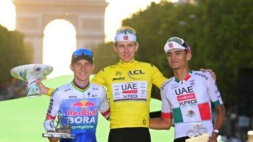 Olympic champion Remco Evenepoel (L) said that his second-place finish have proved that he was right to 'dream' of winning the Tour de France