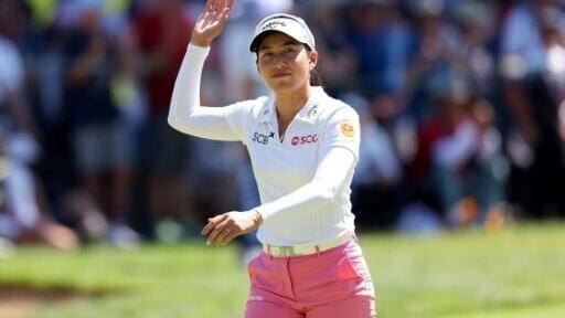 Thailand's Jeeno Thitikul acknowledges fans as she closes out victory in the LPGA Portland Classic