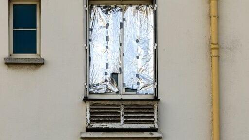 Paris residents without shutters took to novel methods of keeping out the heat during a July heatwave