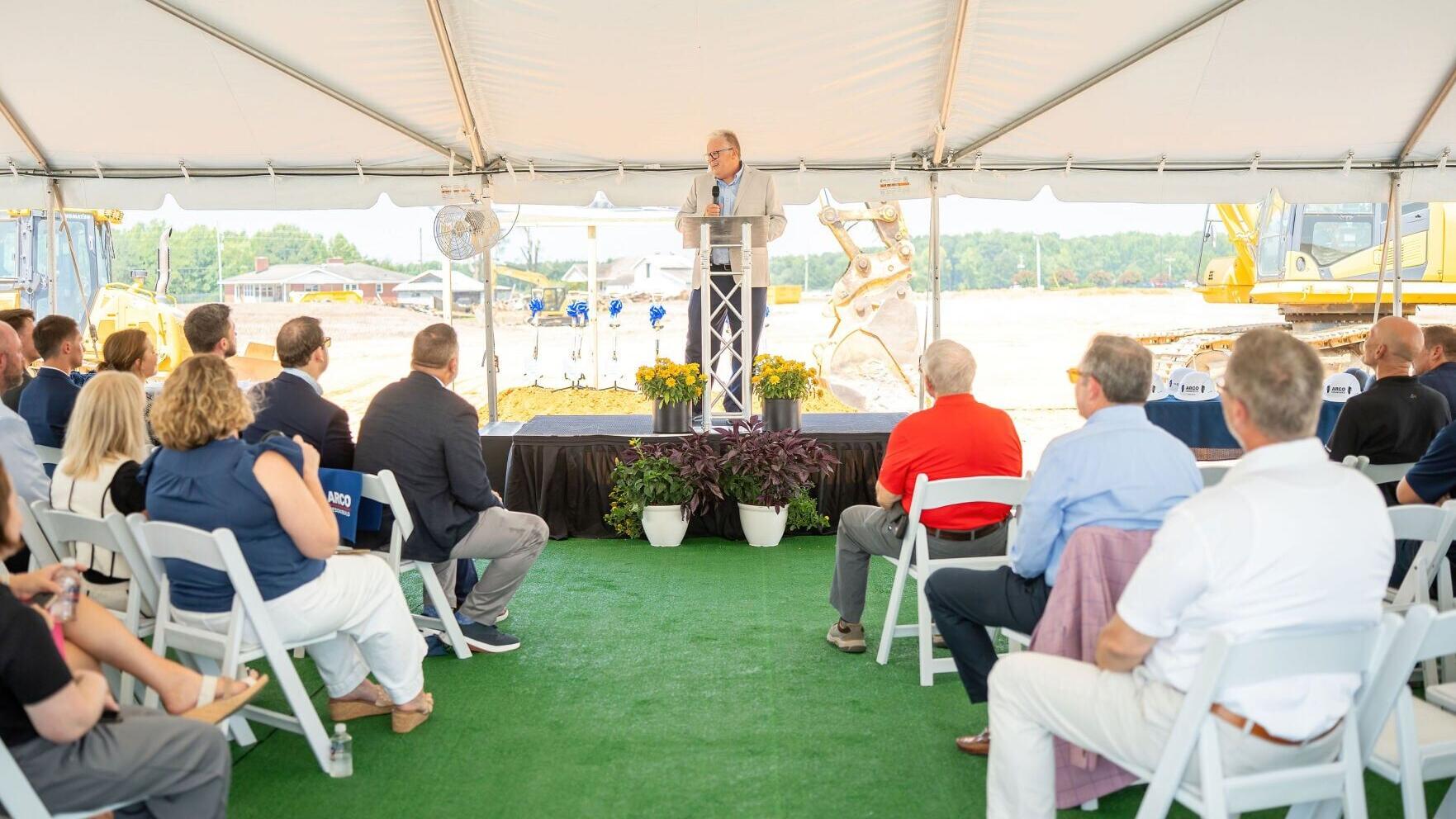 Guests gather under the event tent for the OPW groundbreaking ceremony in Smithfield, North Carolina, as remarks are shared ahead of construction on the company's new manufacturing facility.