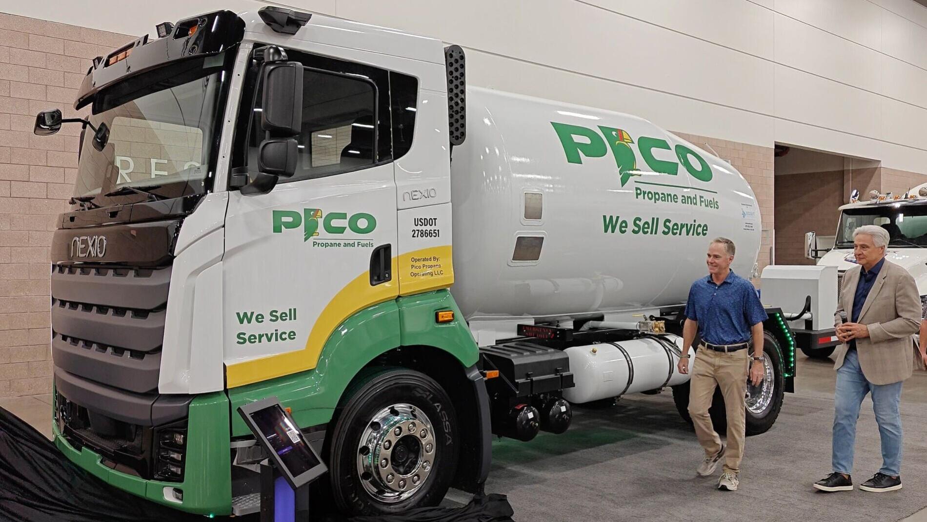 Nexio Power CEO Gary Winemaster, right, and Meritum Energy Holdings President and CEO Chris Hill, left, unveil the PICO Propane and Fuels demonstration truck at the 2026 Red River Crossroads Propane Expo in Irving, Texas, on Saturday, August 8.