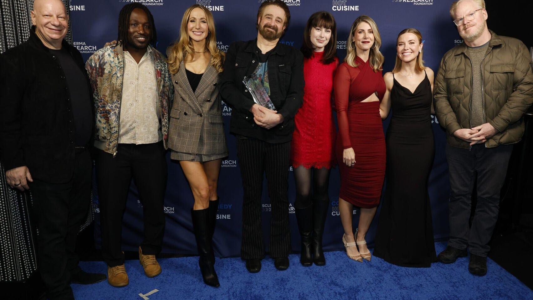 (L-R) Jeff Ross, Hannibal Buress, Nikki Glaser, Adam Duritz, Zoe Mintz, Kelly Rizzo, Kelsey Cook, and Jim Gaffigan attend The Scleroderma Research Foundation's Cool Comedy Hot Cuisine at Edison Ballroom on November 12, 2025 in New York City. (Photo by K...