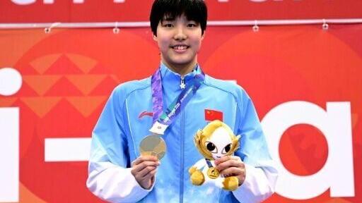 China's Yu Zidi celebrates on the podium