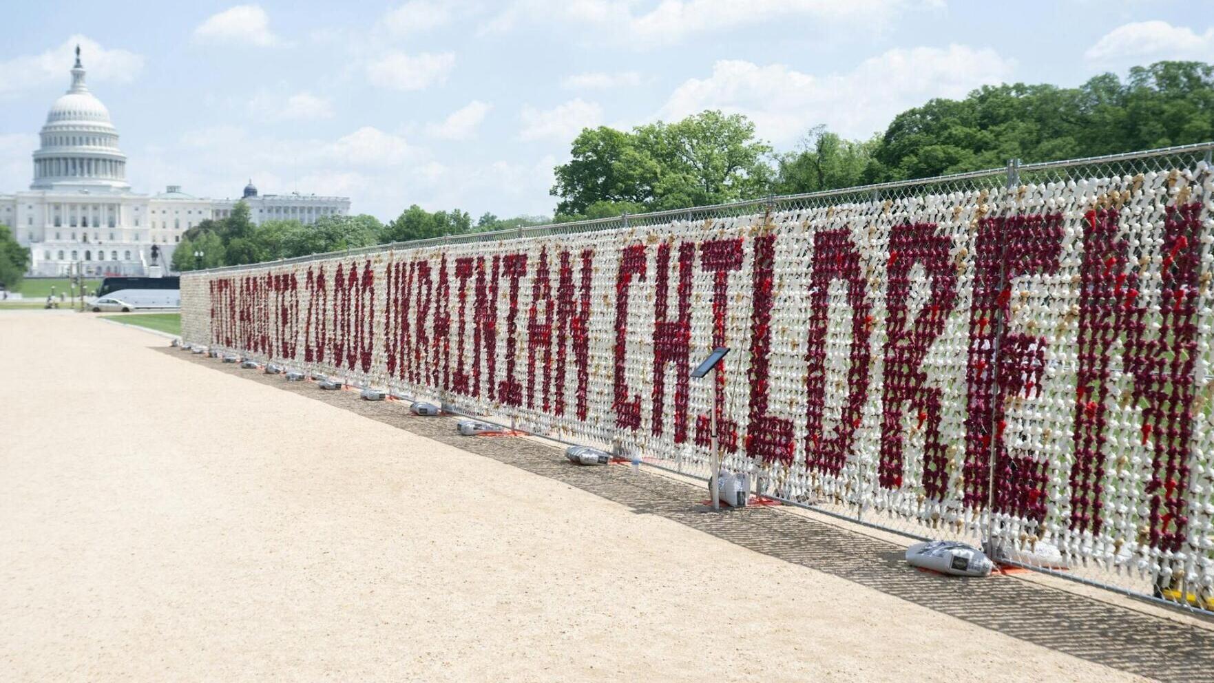 A fence featuring 20,000 stuffed teddy bears, each representing a Ukrainian child abducted by Russia, on the National Mall in Washington, D.C., on April 23, 2026.