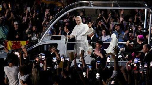 Crowds greeted the pope's arrival at the grotto