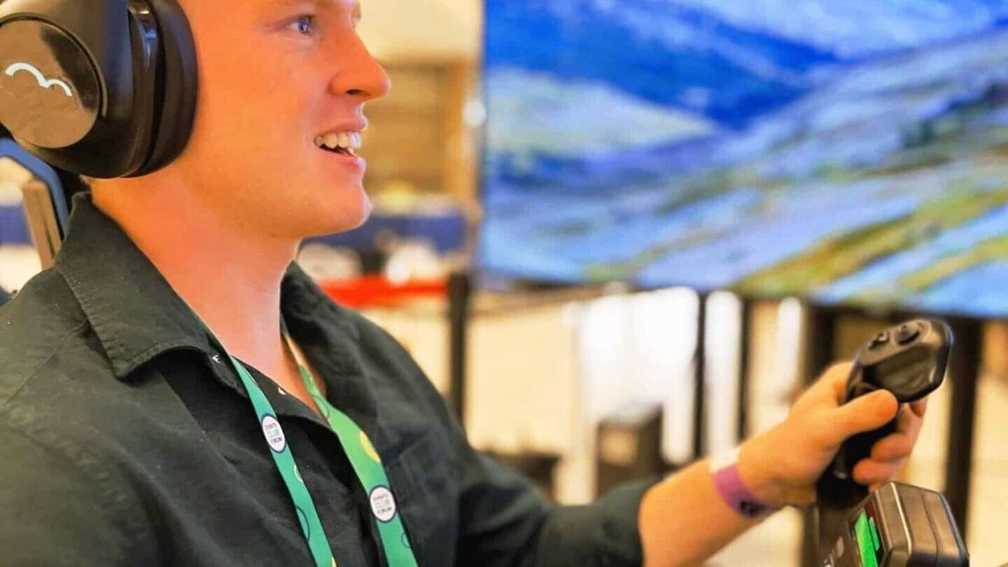 A visitor engages with a ROF™ immersive flight simulator during a live event. RoarFun™ provides compact, high-impact flight simulator rental solutions designed for high-traffic public activations, enabling brands and tourism boards to drive engagement a...