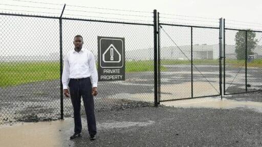 KeShaun Pearson, co-founder of Memphis Community Against Pollution stands in front of SpaceXAI’s data center Colossus I, in Memphis, Tennessee, built hastily to meet the skyrocketing demand for computing power