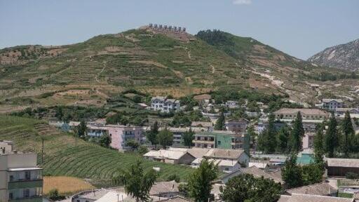 Across the truce line, North Korea's self-declared soup hotspot Kaesong recently simmered in the distance through a heat haze