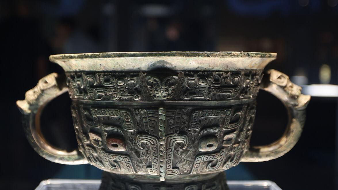 A bronze gui  vessel with taotie motifs, reflecting the sophisticated bronze-casting techniques  of the Shang Dynasty (c. 16th century-11th century BC).