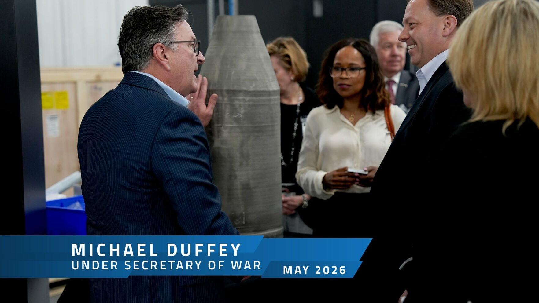 Titomic CEO &amp; Managing Director Jim Simpson showcases a large-scale warhead component to Under Secretary of Defense Michael Duffey during a visit to Titomic USA, May 2026.
